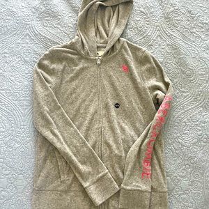 Abercrombie hooded zip up jacket with moose logo. Fits women’s XS/S